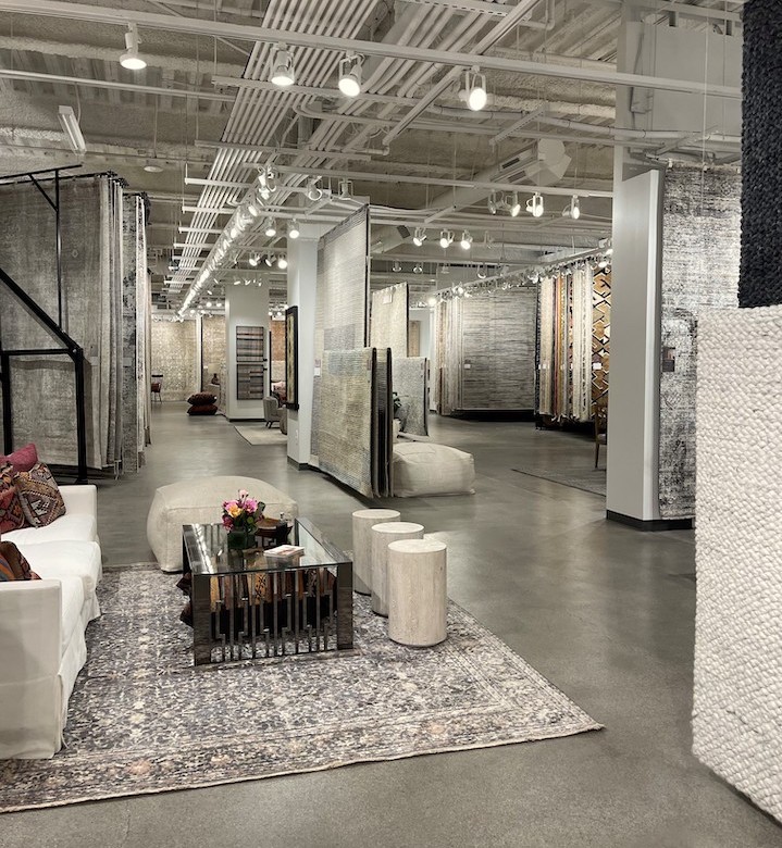 an overview showroom image of rugs near the entry area to Loloi's expanded Las Vegas footprint